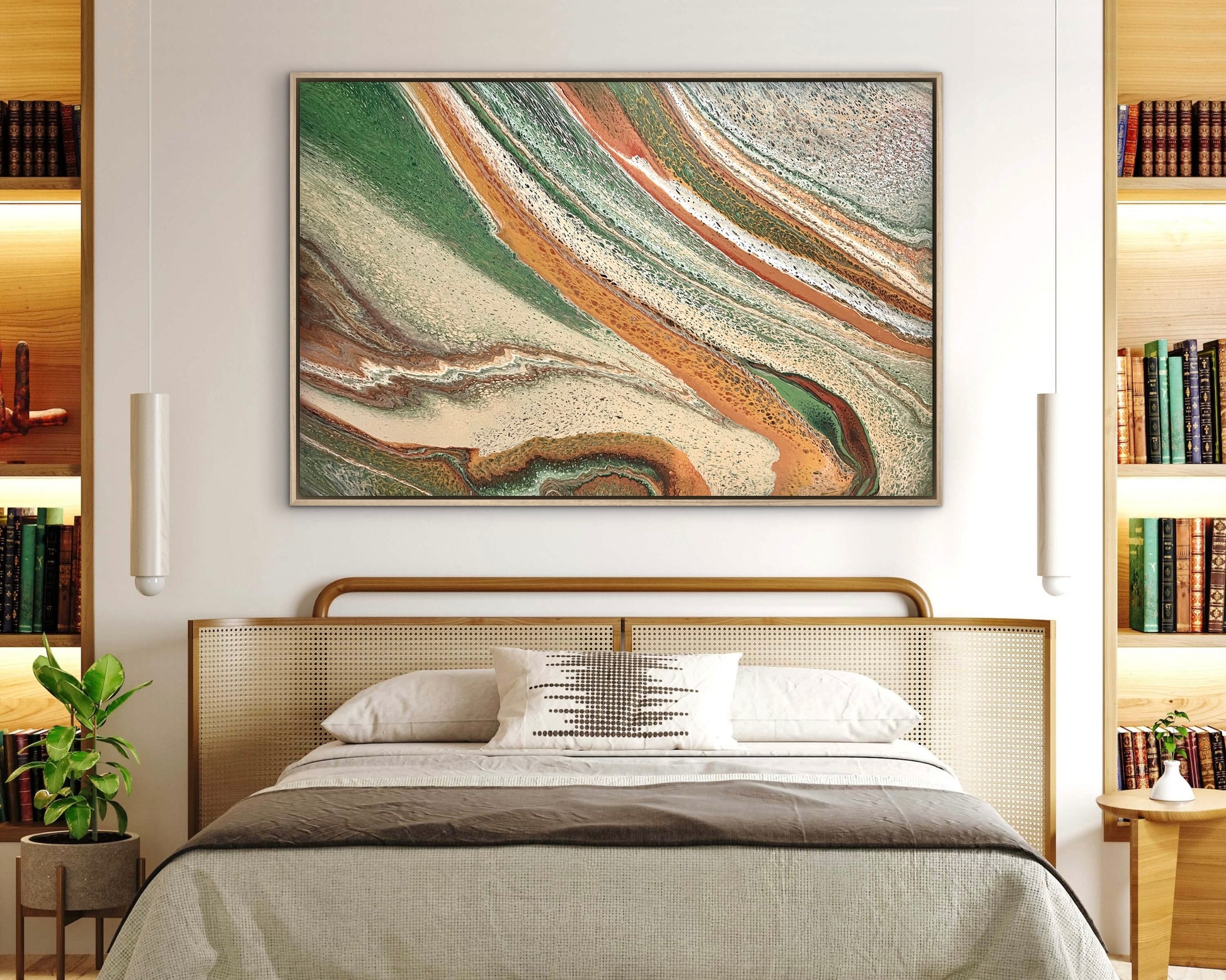 Sculpted Plains green and terracotta abstract landscape painting displayed above a cane bed in a contemporary bedroom
