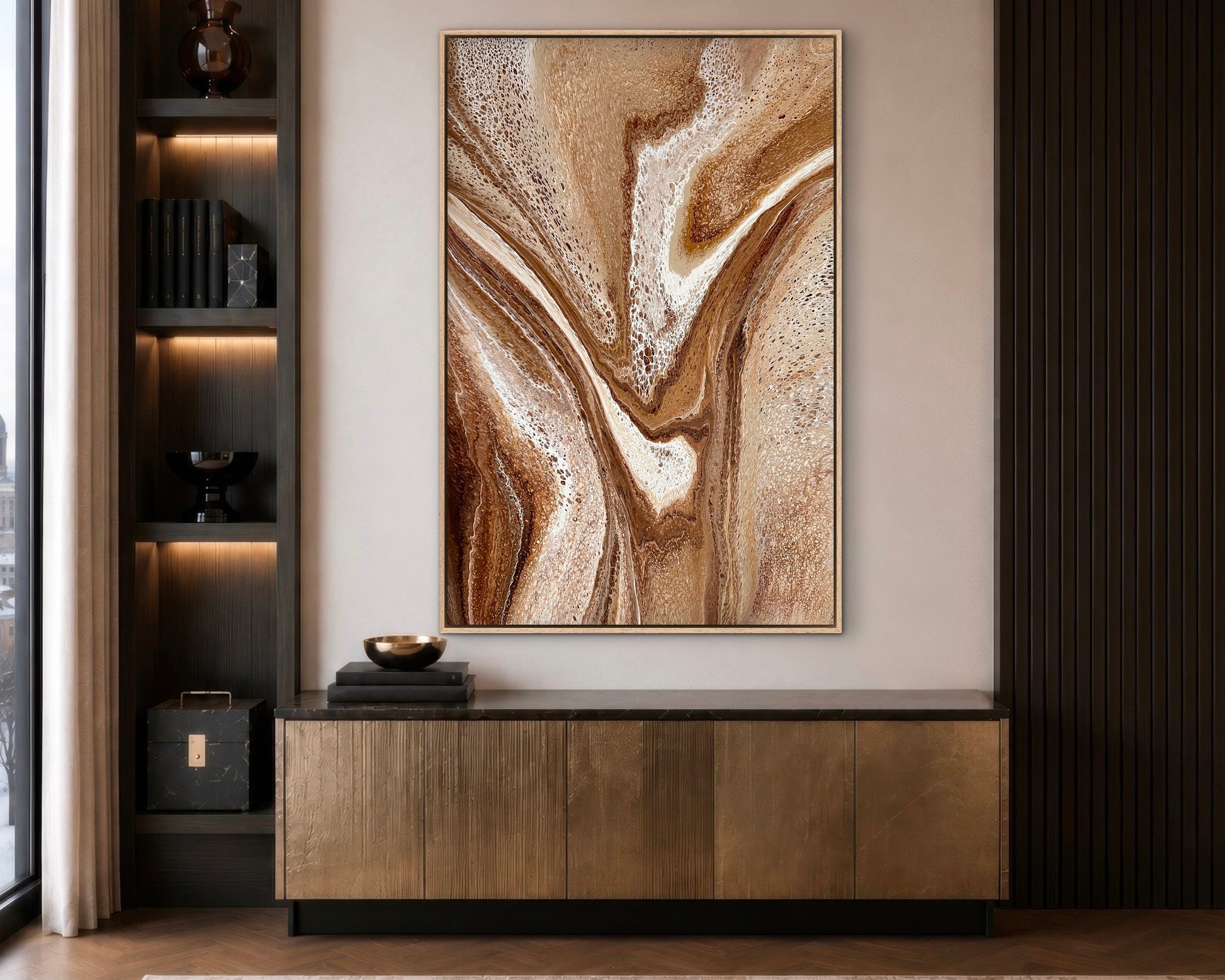 Restless Terrain warm brown abstract painting displayed vertically above a timber sideboard in a dark modern interior

