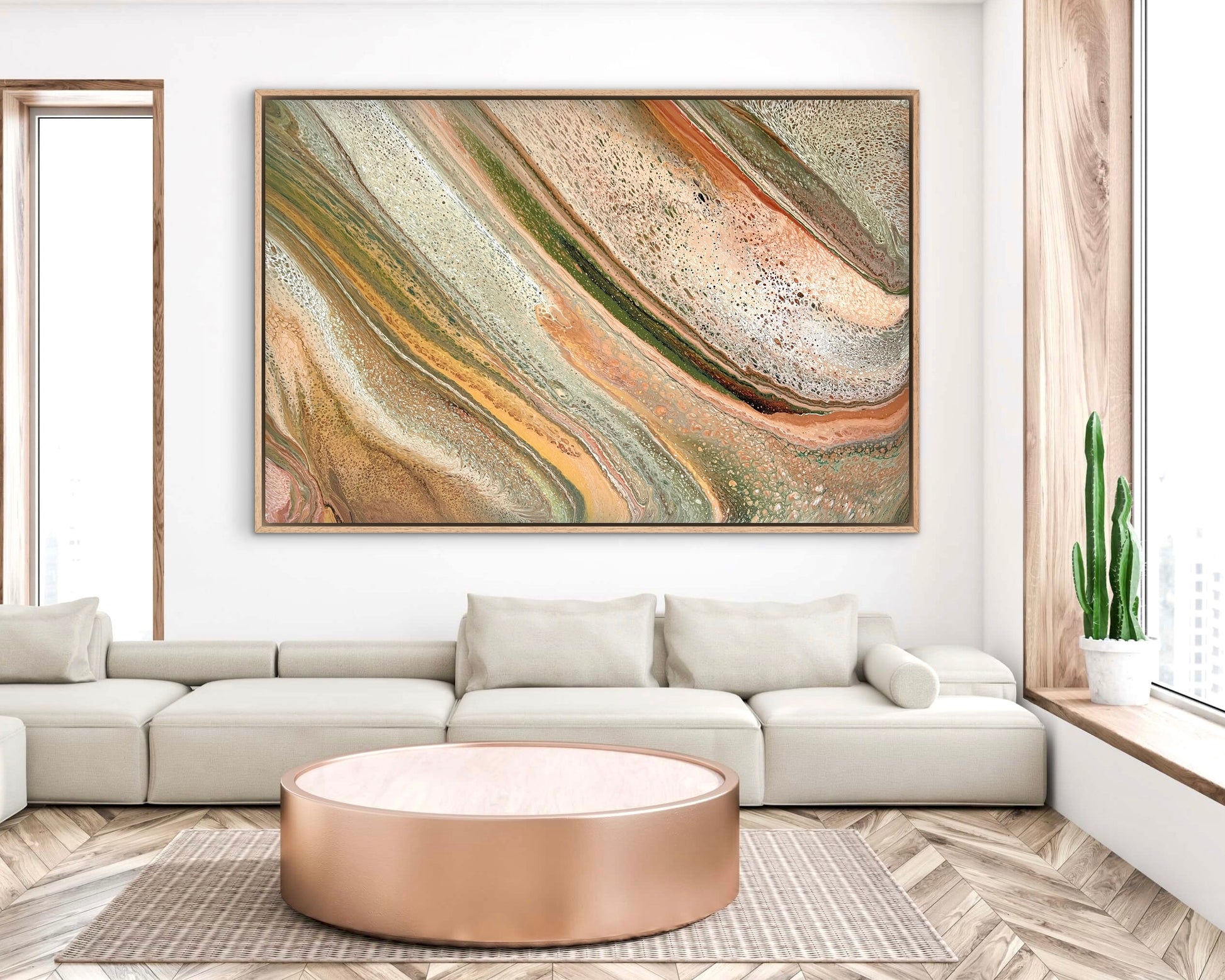 Alt text: Natural Forms oversized original abstract painting in soft earthy tones, styled above a white sectional in a bright contemporary living room