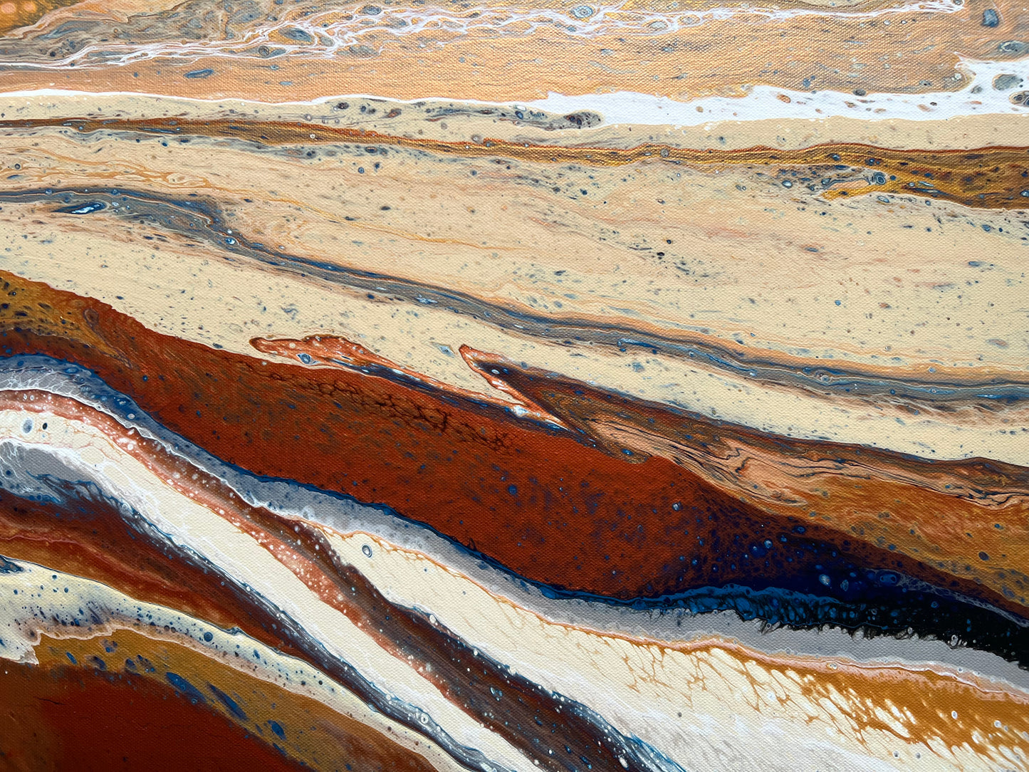 Detail of Desert Drift contemporary abstract artwork featuring terracotta, cream and navy bands, subtle metallic accents and fine line work