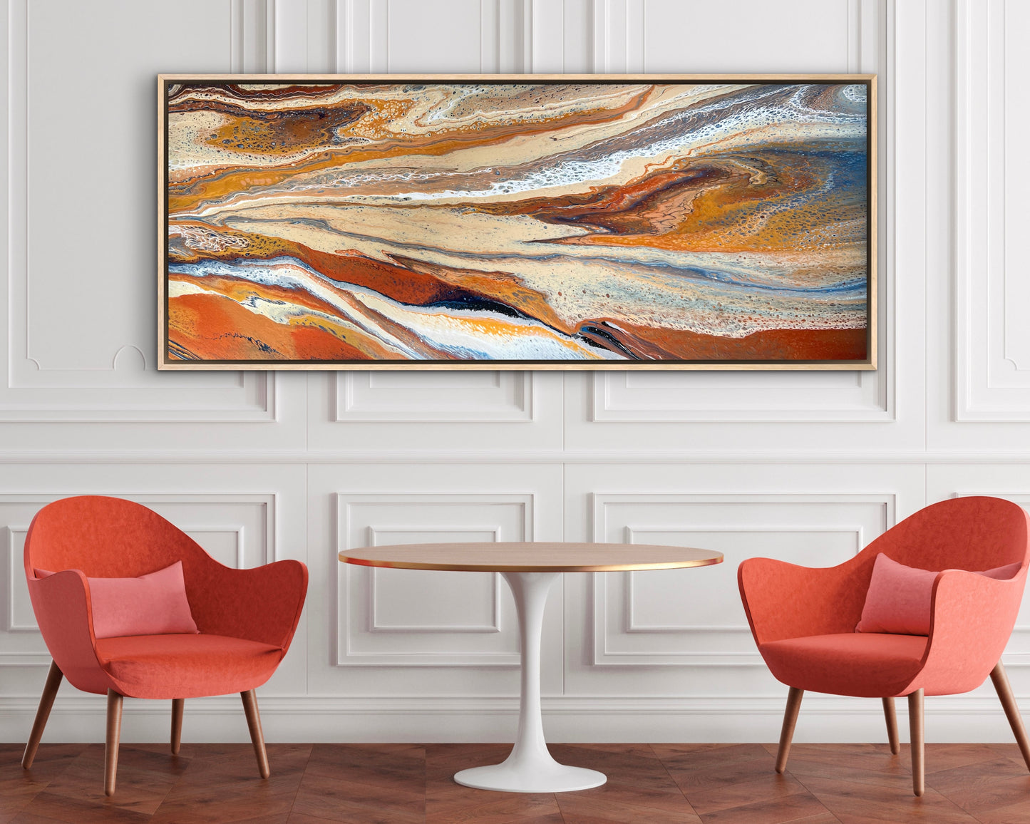 Desert Drift large horizontal original painting in rust orange, cream and blue, displayed above lounge seating in a contemporary hospitality-style interior