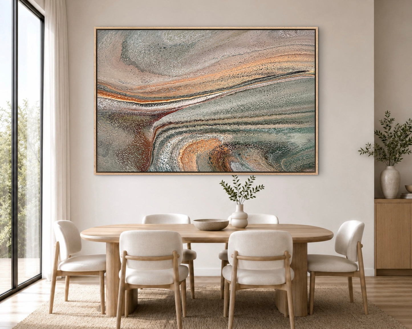 Shifting Ground oversized original abstract painting in muted green, soft grey, blush and copper, displayed above an oval timber table in a neutral contemporary dining room